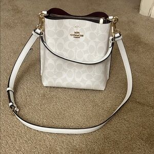 Coach White Bucket Bag with Gold and Red Details